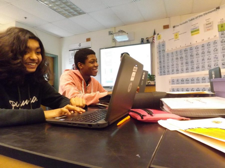 Anjali+Pillendula+and+Dedrick+Pierce-Biney%2C+two+eighth+grade+ESOL+students%2C+take+a+test+on+the+Periodic+Table+of+Elements+in+Mr.+Kevin+Reif%E2%80%99s+science+class%2C+on+Nov.+28%2C+2018.