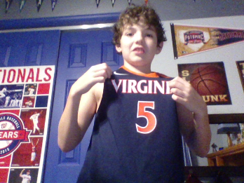Connor Tapp wears his Kyle Guy jersey and is sad that he is leaving