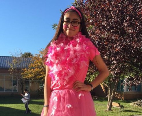 A student dresses in pink for a past Pink Panther Day at school.