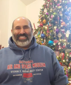 As someone who loves space, Mr. Moosa Shah, a seventh grade Biology teacher shows off his NASA Air and Space Museum sweatshirt. 