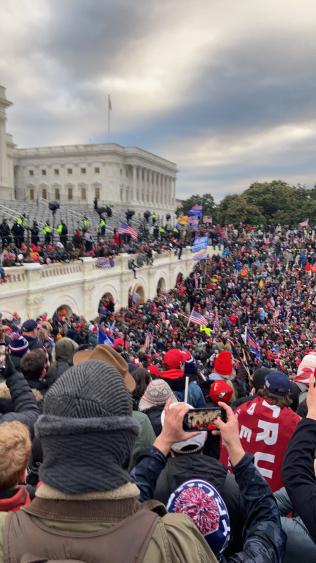 Pro-Trump rioters gather around the U.S. Capitol building on Jan. 6, 2021.