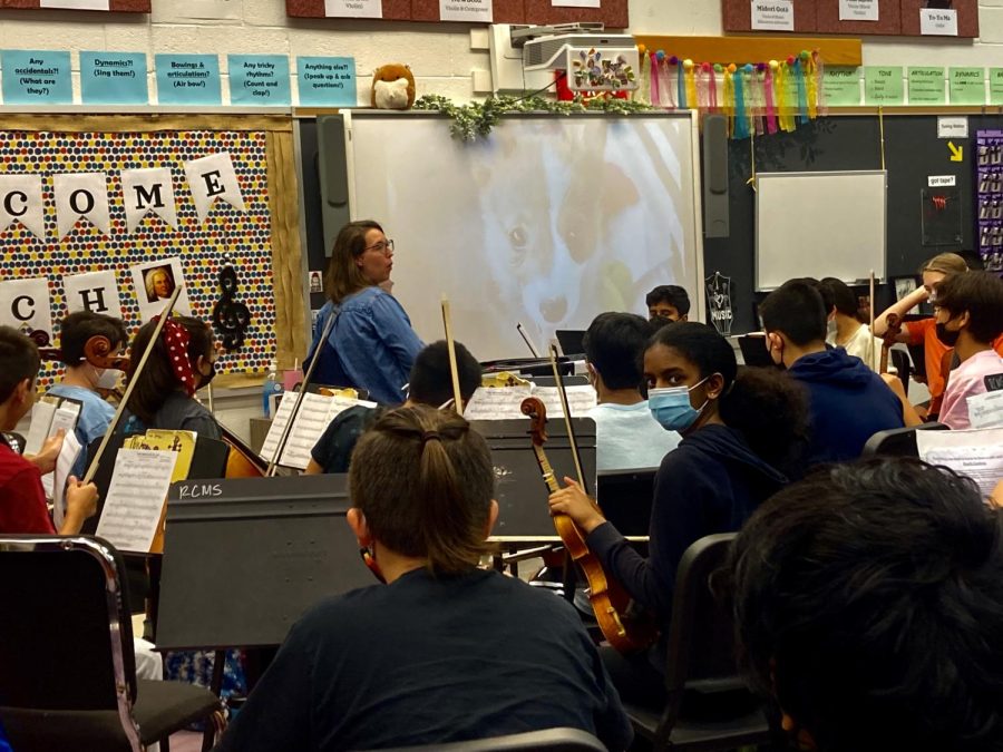 Mrs. Devyn Grimes instructs RCMSs Concert Orchestra.