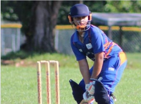 Rohan Deshmukh is getting ready to hit a ball in cricket