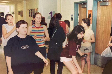 Ms. Lisa Riddle walks down the hallway at RCMS in 2001 as a student.