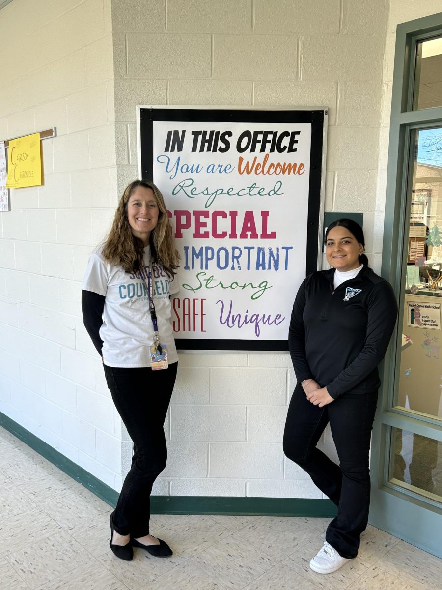Ms. Ghafori counselor and Mrs. Ryder counselor  stand by student services door  