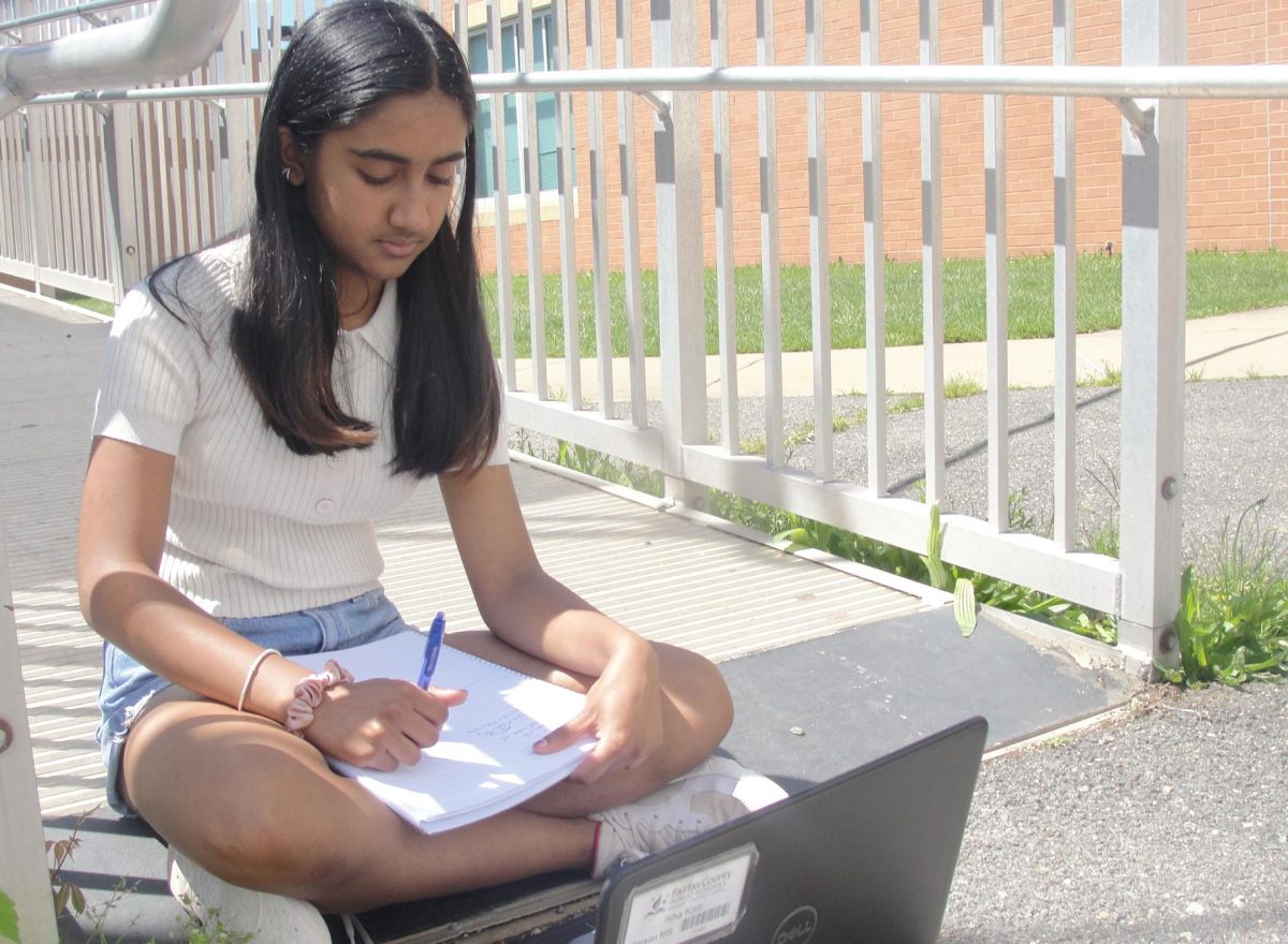 Isha Katti, 13, of the Champions team, reviews math on May 16 for the SOLs.