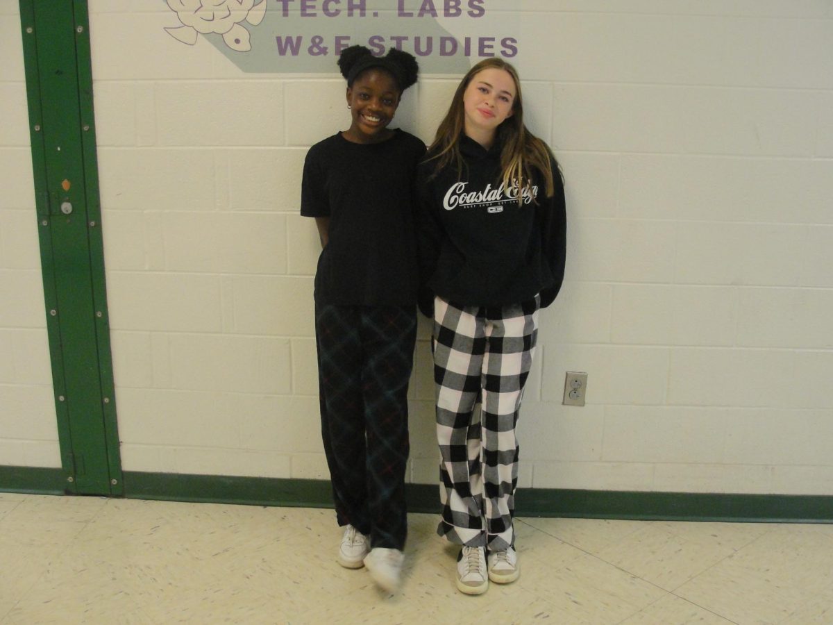 Leah Kingombre and Emma Hardy smiling in their pajamas Nov.18.