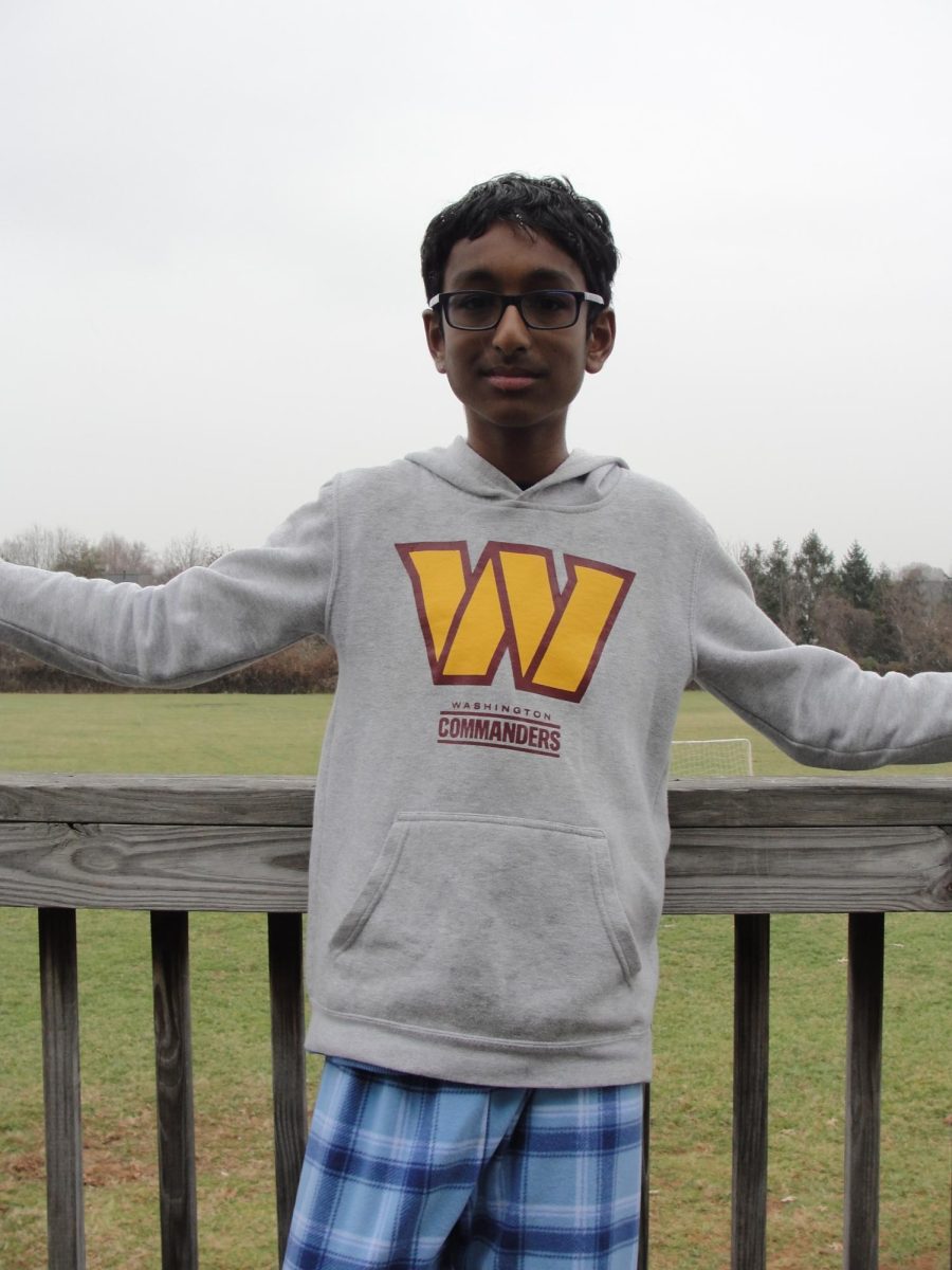 Aarush, 12 years old, on the Trailblazers team, displaying the incoming snow.
