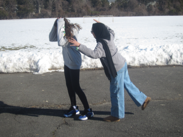 Inaya Hasan chasing Gina Barylski. 
