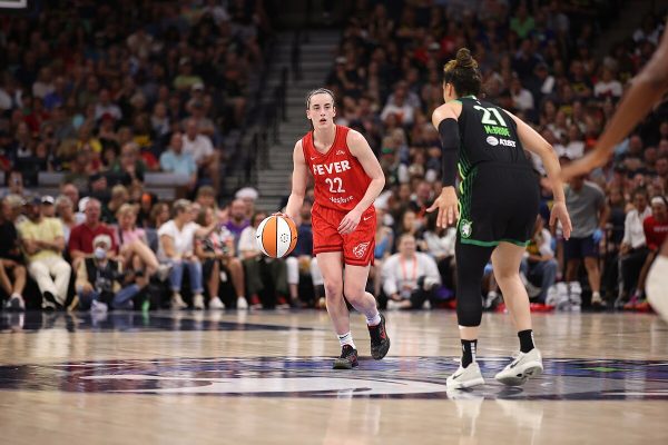 Caitlin Clark (left) on the Indiana Fever faced off against Kayla McBride (right) on the Minnesota Lynx, on July 14, 2024, during the previous season. 