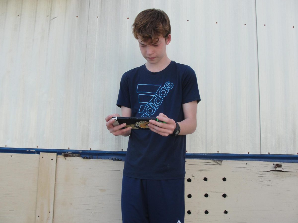 Jack Dalton, 13, on the Dream team, playing on the Nintendo Switch Oled